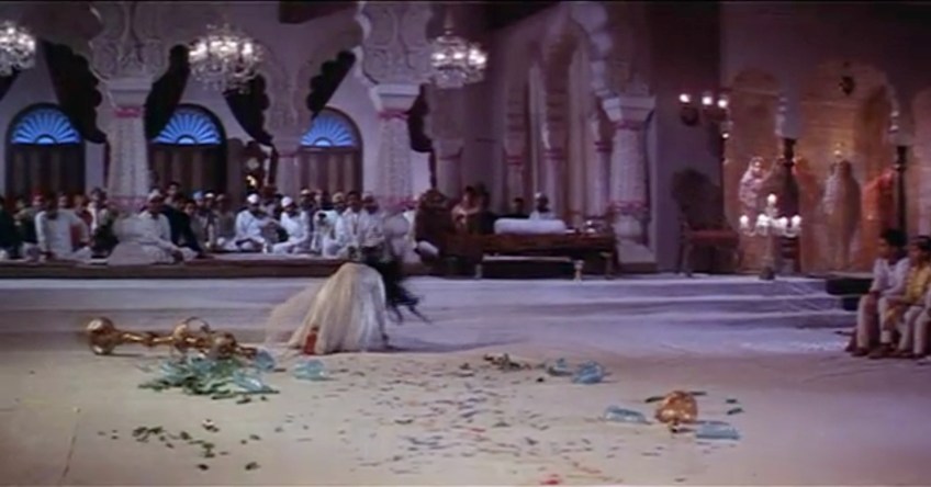 Flinging herself onto the floor, Pakeezah's hair swirls like a madwoman.