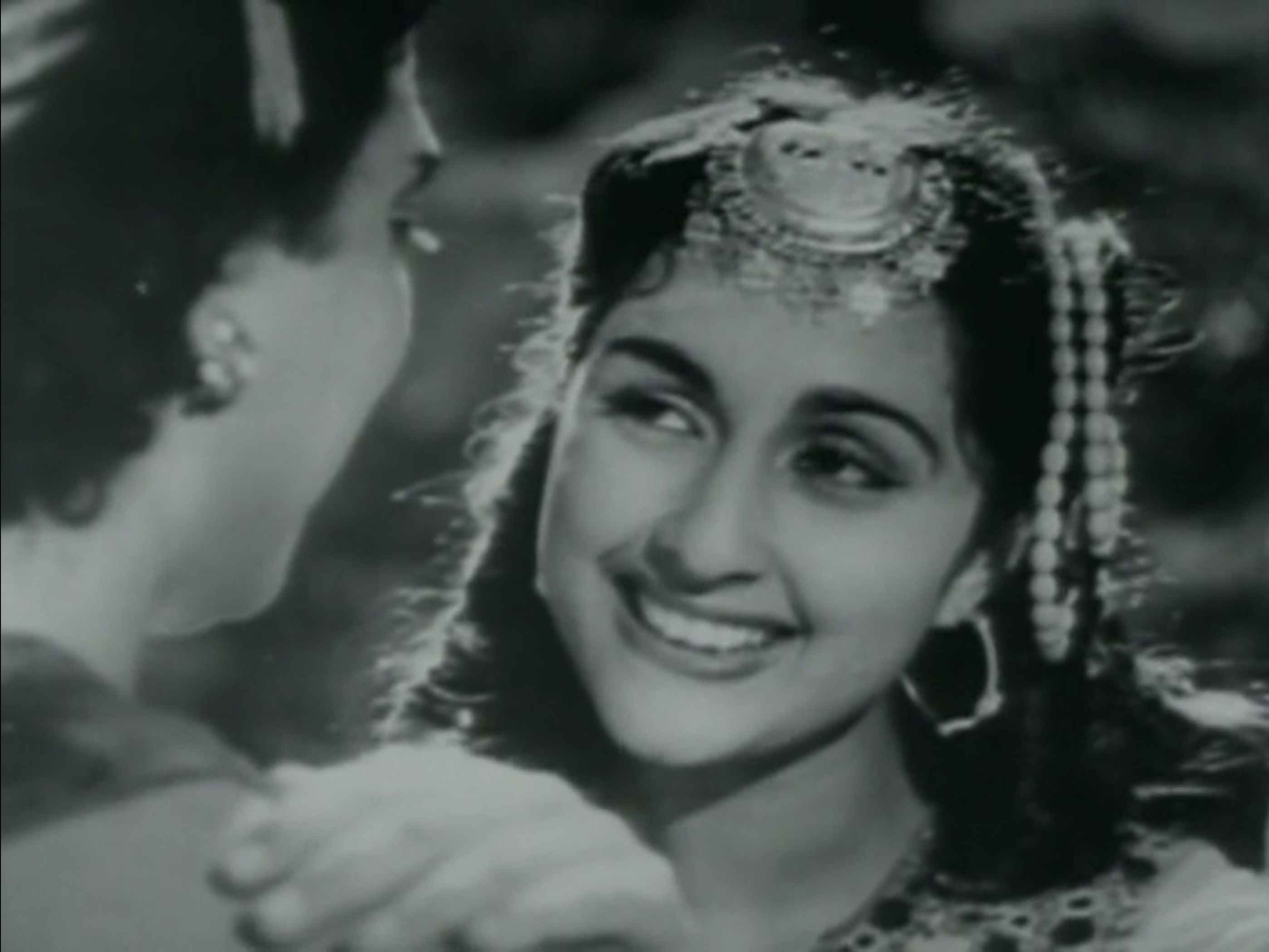 Bina Rai's lovely smile in Anarkali (1953)